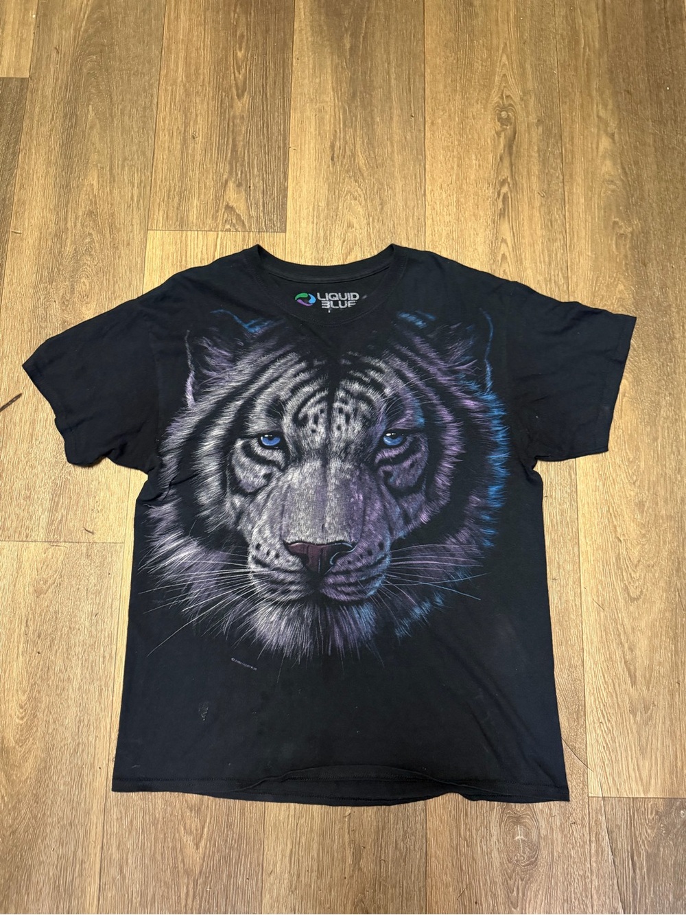 Liquid Blue Black Tee with Green, Blue and Purple Logo